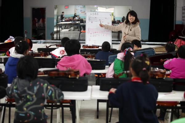 Touching orphans' souls with sound of music