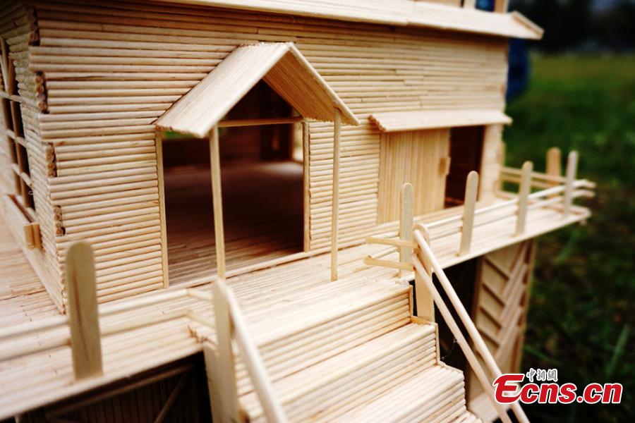 Students create 'villas' with small wooden sticks