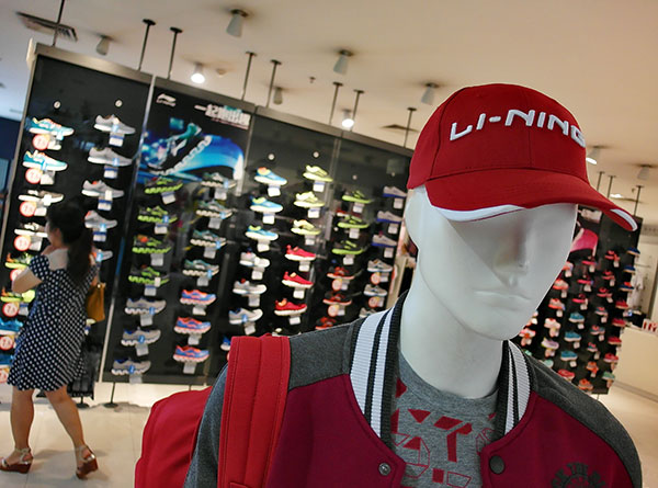 Li Ning narrows losses in H1