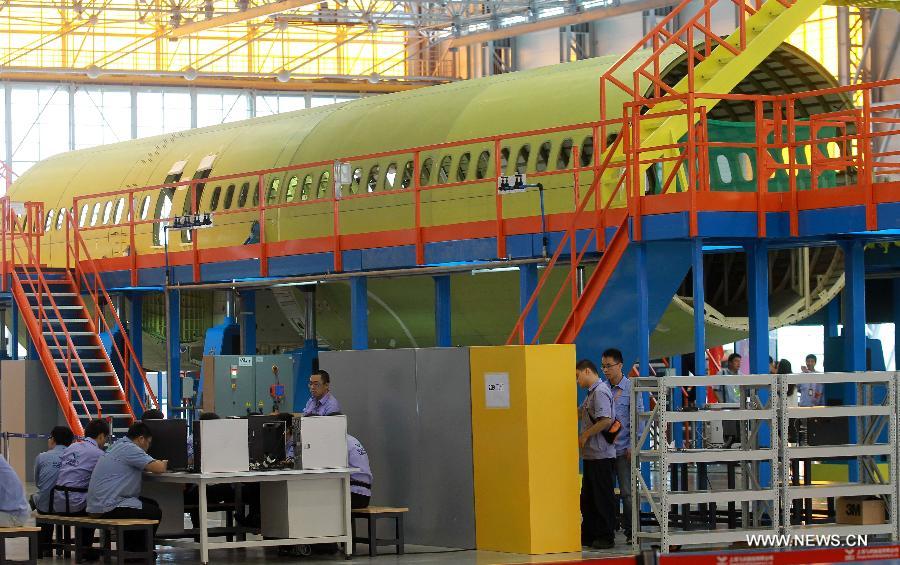 China's 1st C919 airliner starts structural assembly in Shanghai