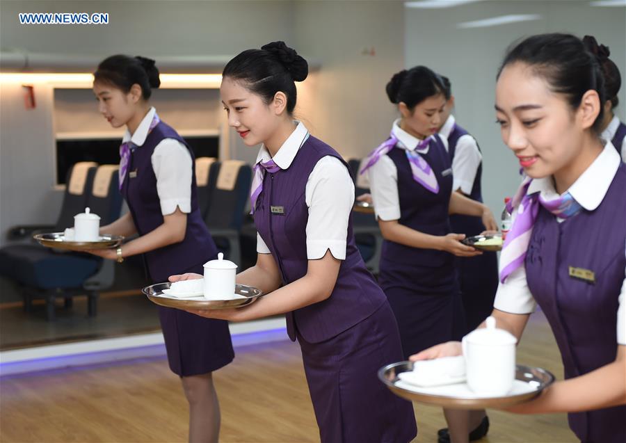 Crew members of bullet trains in E China prepare for G20 Summit