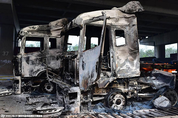 Almost ten thousand new cars ruined in Tianjin blasts