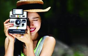 Actress Yuan Quan poses on beach