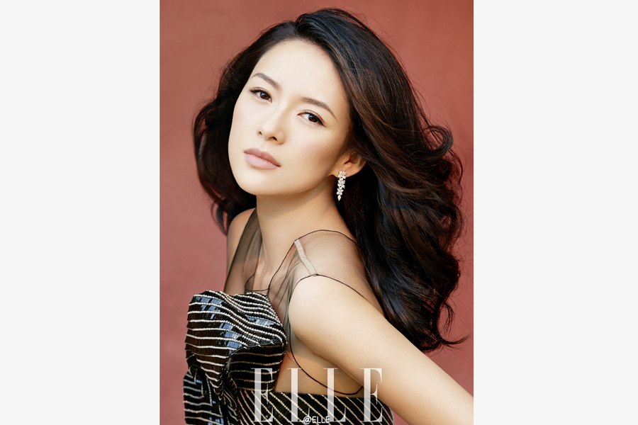 Actress Zhang Ziyi poses for fashion magazine