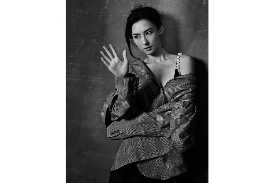 Actress Cecilia Cheung poses for fashion magazine