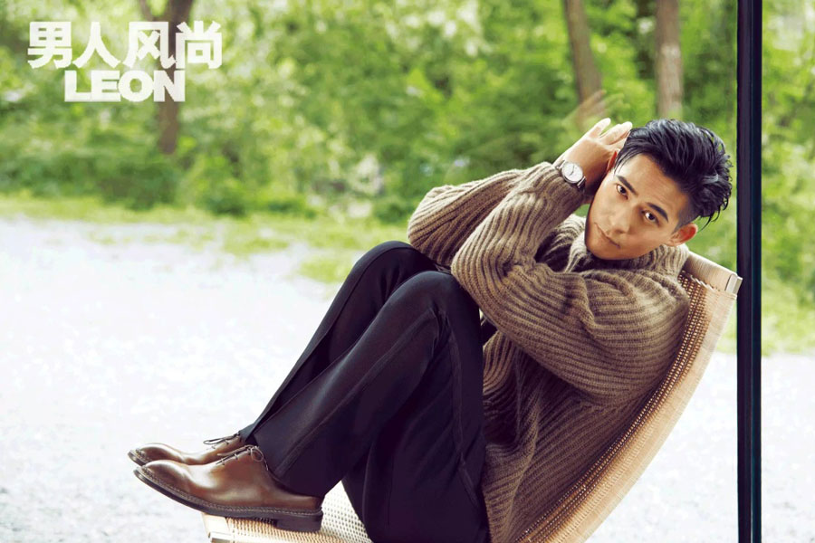 Actor Vic Chou poses for the fashion magazine