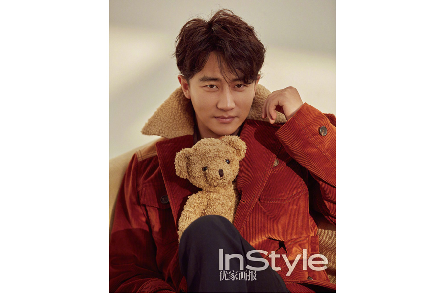 Actor Huang Xuan poses for fashion magazine