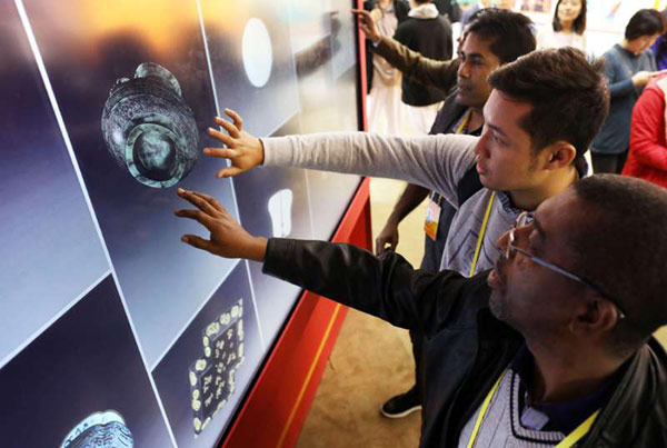 Foreign journalists visit exhibition showing China's progress