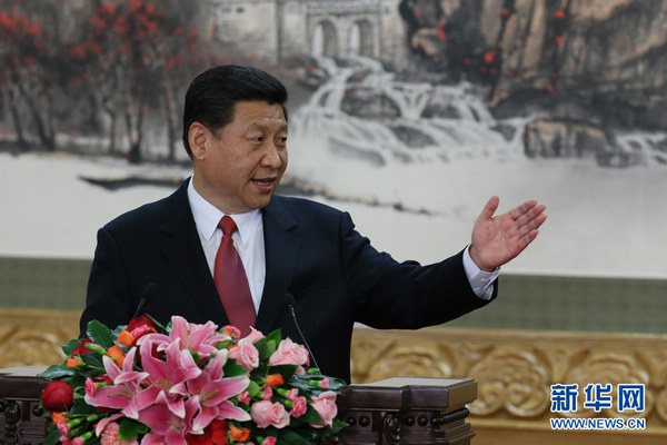 Xi speaks at press conference