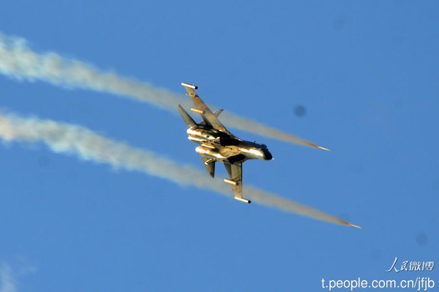 J-11 fighters hold live-fire training