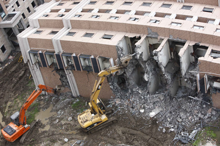 Demolition of collapsed building in Shanghai underway