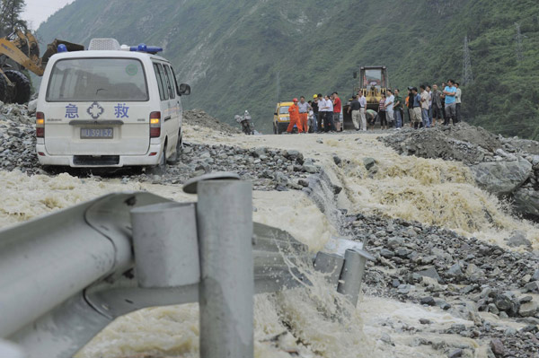 Cave-ins hinder efforts to repair damaged highway