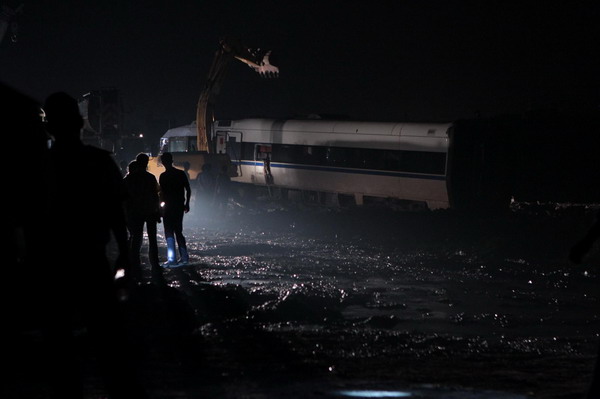 Train wreckage dismantled for probe