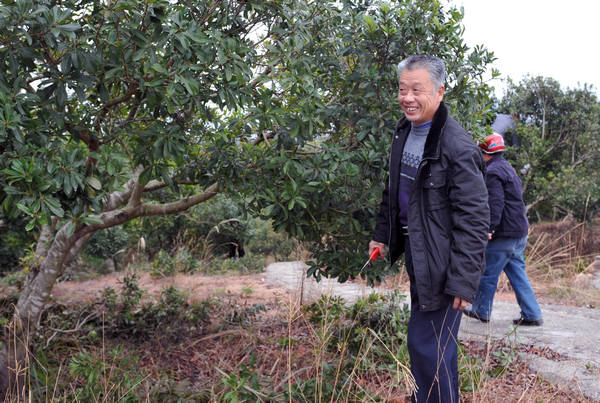 Pioneer farmer enjoys fruits of his labors