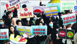 Cathay flight attendants threaten holiday action