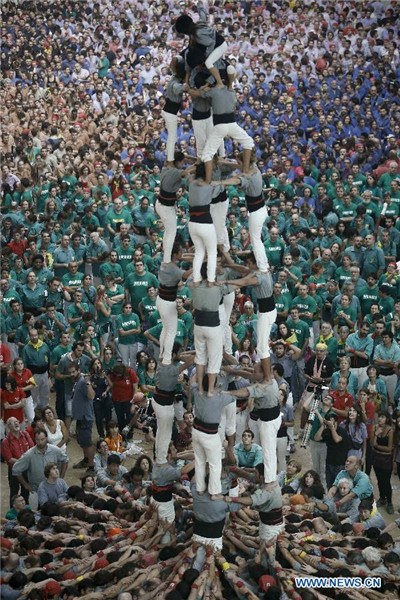 Chinese girl in local Spanish human tower team