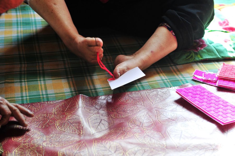 Disabled woman uses her feet to care for husband