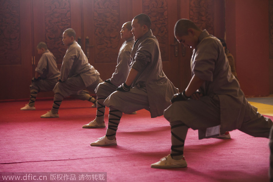 Buddhist monk breaks brick in kung fu