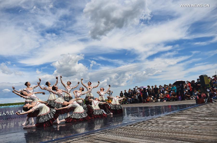 Ballet dancers perform at Zhalong National Nature Reserve in China's Qiqihar