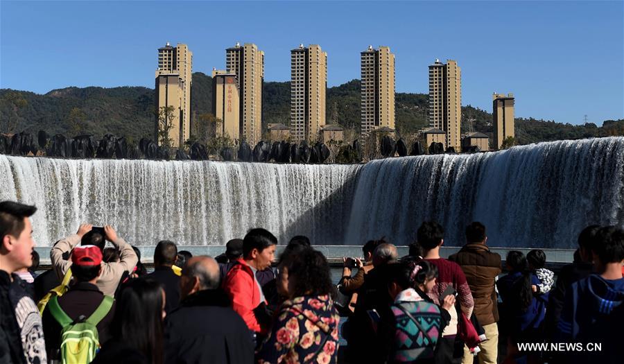 Park featuring 400m-wide manmade waterfall opens in Kunming