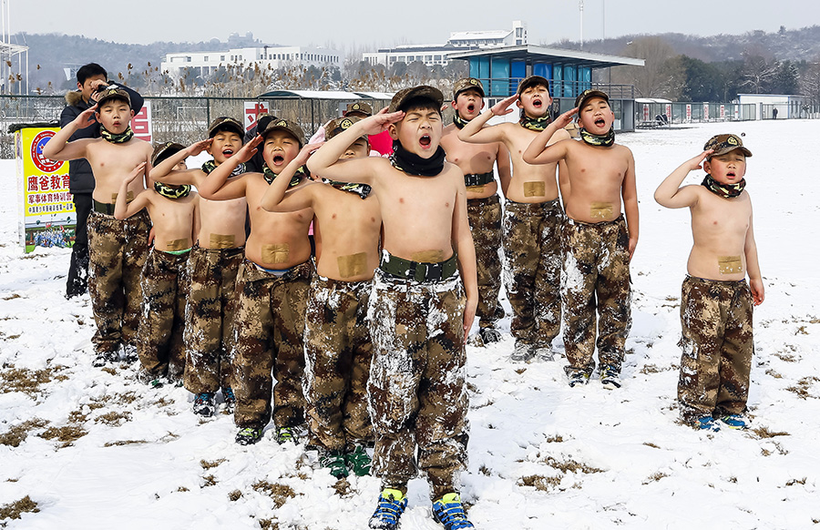 Topless children in wintry cold raises online furor