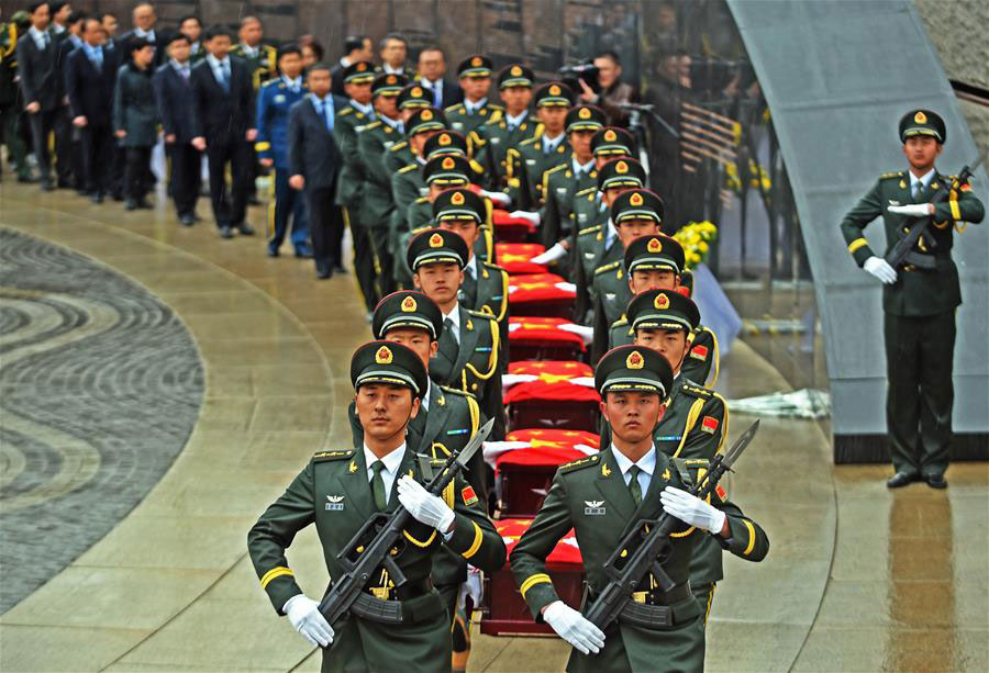 China holds burial ceremony for soldier remains returned from ROK