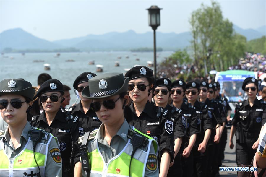 Female patrol team seen at West Lake in Hangzhou