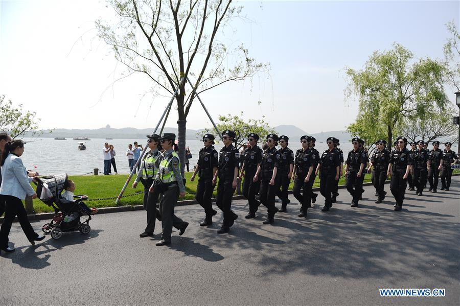 Female patrol team seen at West Lake in Hangzhou