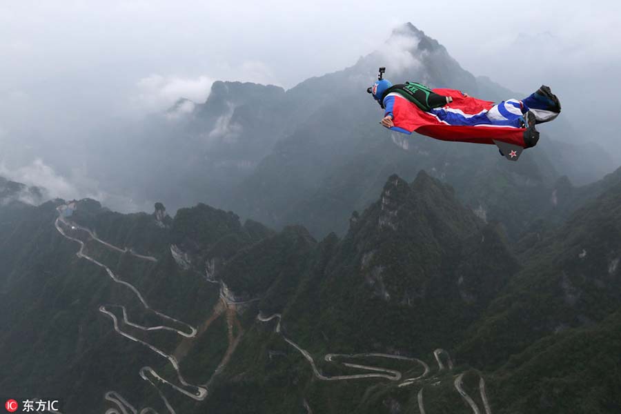 Flying over the mountains in wingsuit