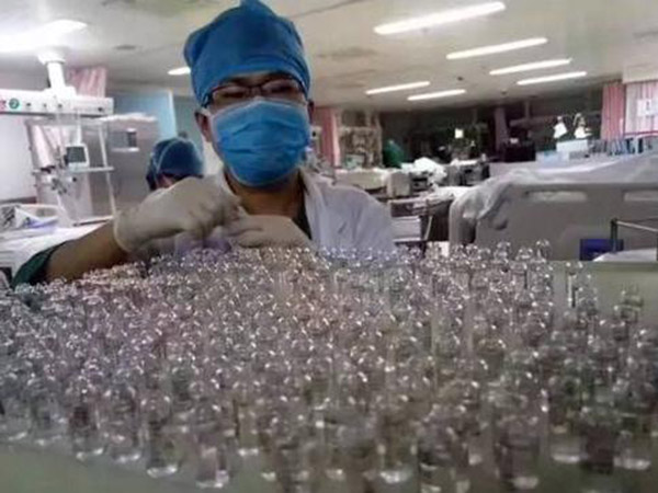 Medical staff opens 8,000 medicine bottles by hand to save patient