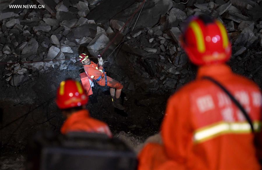 Rescue work underway after SW China's devastated landslide