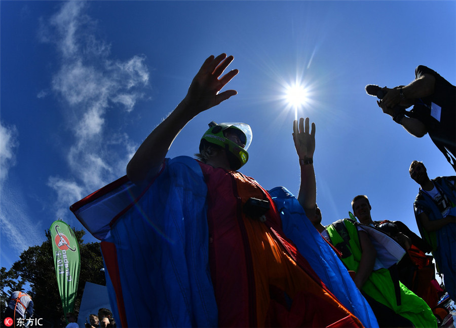 Wingsuit flying championship kicks off in Hunan