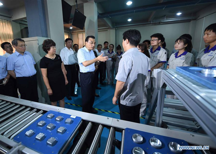 Premier stresses vocational education to boost 'Made in China'