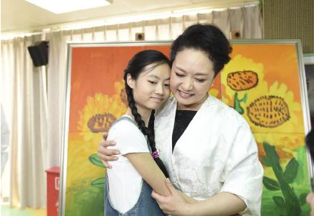 China's first lady visits children with autism in Beijing