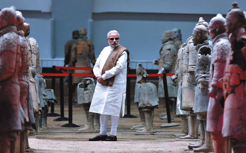 After warm greeting in Xi'an, Modi visits temple, warriors