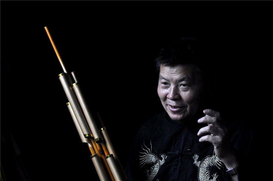 Inheritor of reed-pipe wind instrument 'Lusheng' in Guizhou