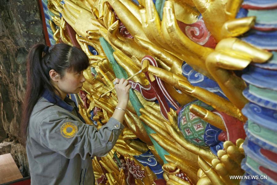 Restoration work of Guanyin sculpture enters final phase