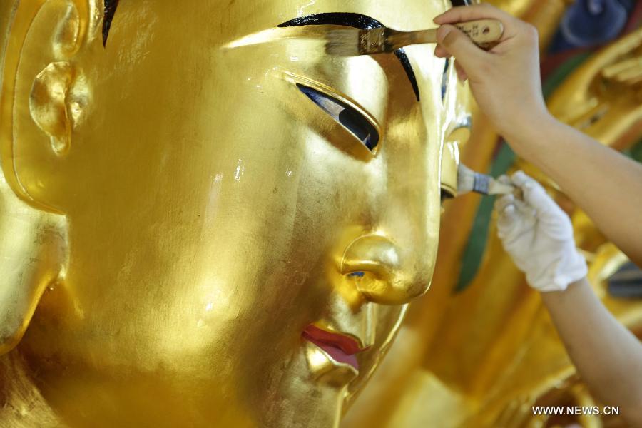 Restoration work of Guanyin sculpture enters final phase