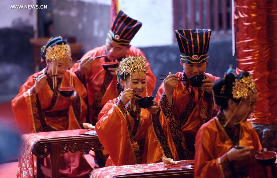 Group traditional Han wedding held in China's Rucheng