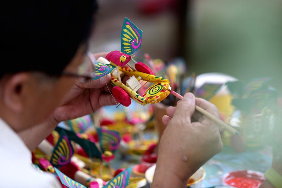 Ancient wood-cut toys still popular in Southern Shandong