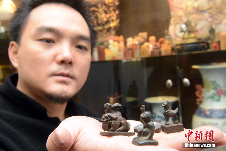 Copper Chinese Zodiac stamps shown in SE China