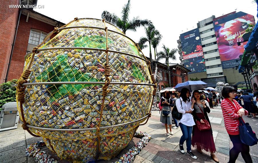 Artworks made of compressed cans displayed in streets of Taipei