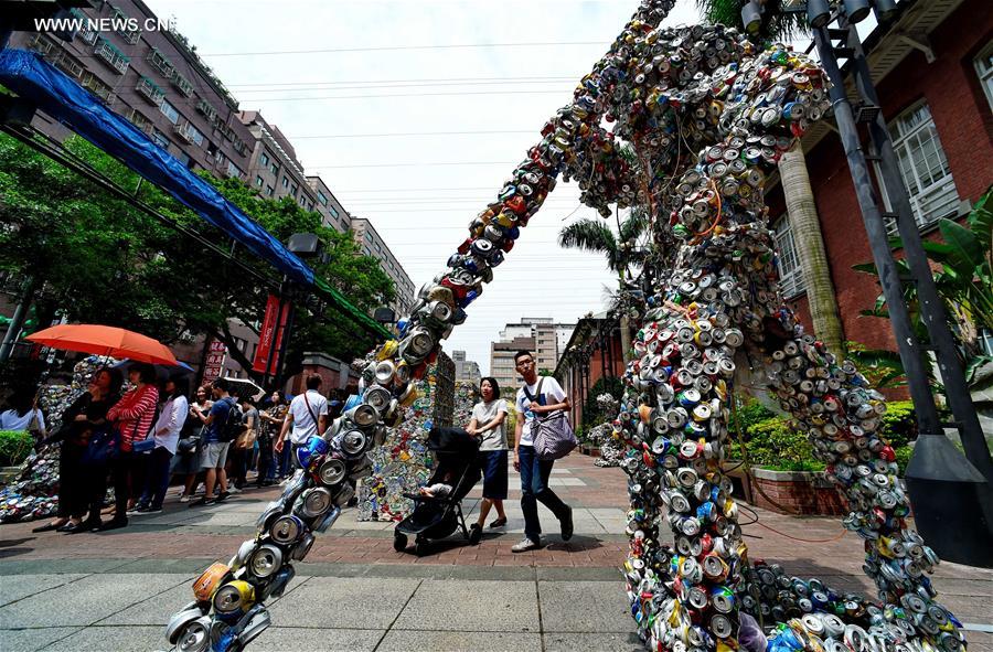 Artworks made of compressed cans displayed in streets of Taipei