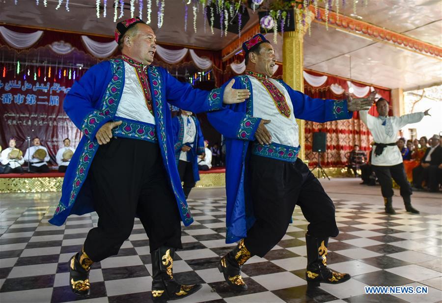 Folk artists attend traditional Muqam contest in China's Xinjiang