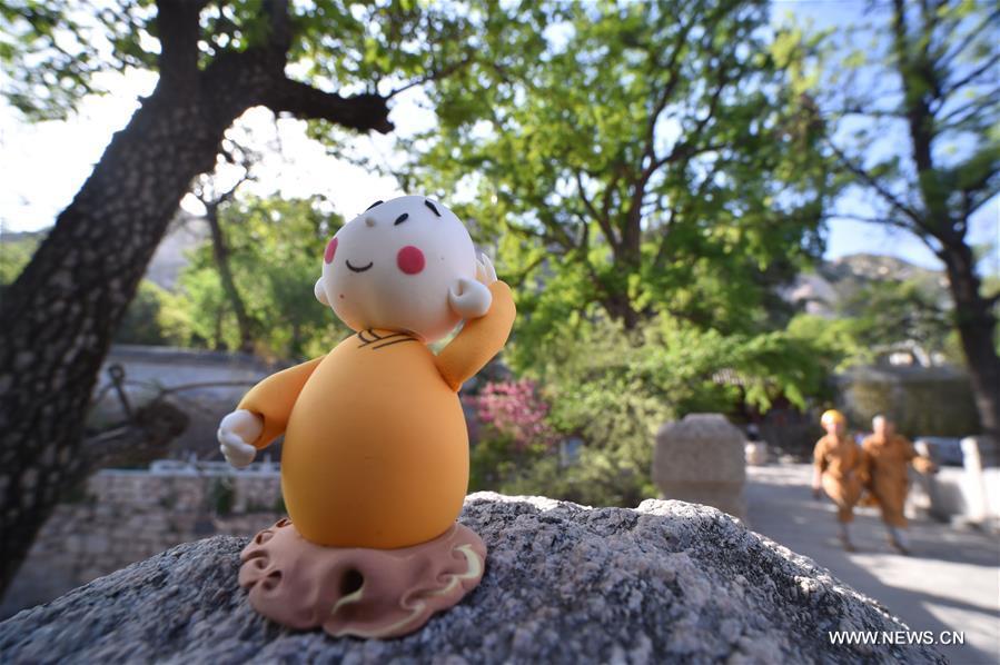 Cartoon character Monk Xian'er of Longquan Monastery in Beijing