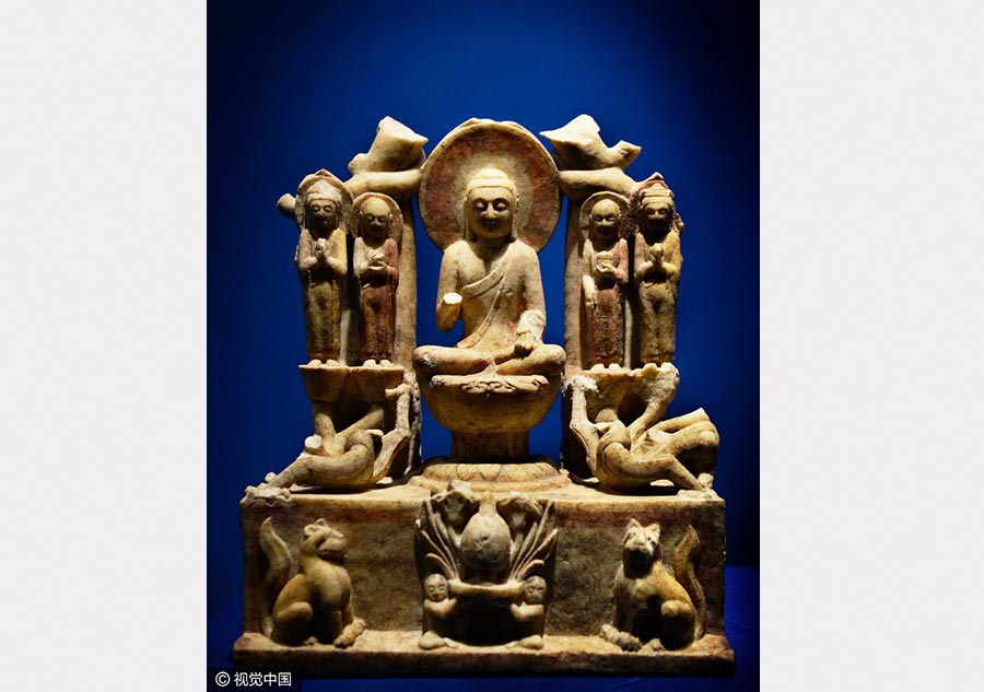 Chinese and Indian sculptures on display at the Palace Museum in Beijing