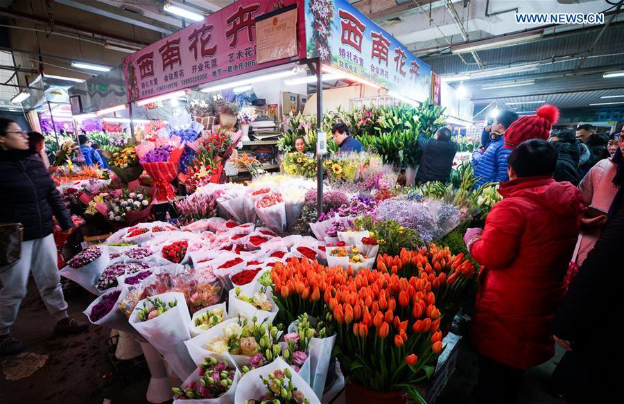 Customers shop at flower market in Beijing