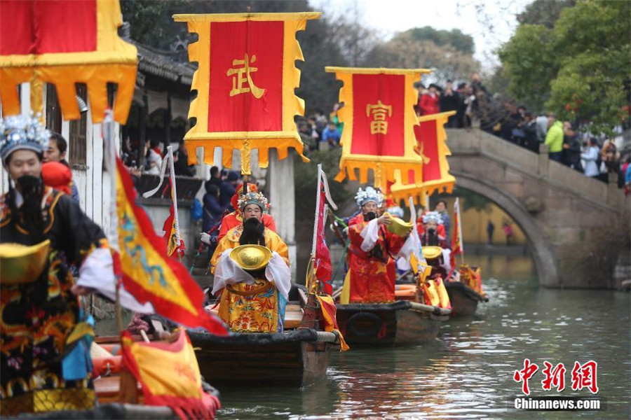 Water village welcomes 'God of Wealth' with ancient ceremony