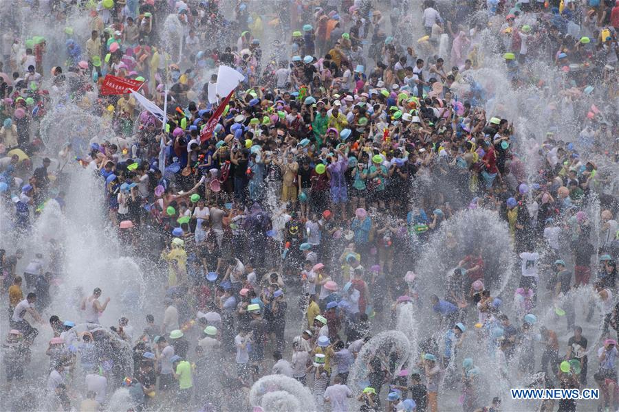 Water-sprinkling festival marked in SW China