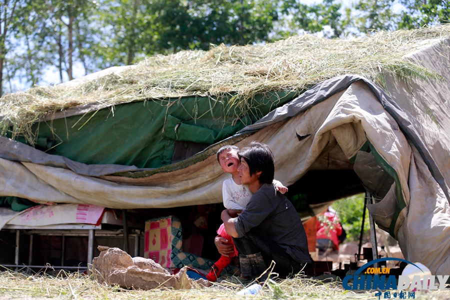 震區(qū)表情：甘肅定西6.6級地震災(zāi)后見聞